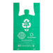 A green plastic bag with white text that reads "Go Green"