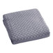 A grey quilted Berkshire Hospitality coverlet.