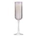 A Libbey pink champagne flute with a purple rim.