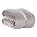 A folded gray Berkshire Hospitality Serasoft+ blanket.