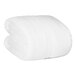 A rolled white Berkshire Hospitality Serasoft+ blanket.