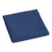 A blue and white quilted botanical leaf pillow sham.