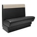 A beige booth with a black seat and back.