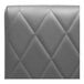 A graphite leather single back booth with diamond tufting.