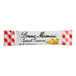 A white package of Bonne Maman apricot preserves sticks on a table.