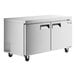 An Avantco stainless steel undercounter freezer with black handles on wheels.