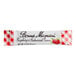 A Bonne Maman raspberry preserves stick in a small white and red checkered package.