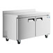 An Avantco stainless steel worktop freezer with black handles on wheels.