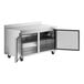 An Avantco stainless steel worktop freezer with a door open.