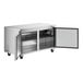 An Avantco stainless steel undercounter refrigerator with two doors open.