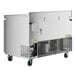 An Avantco stainless steel worktop freezer on wheels.