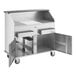 A stainless steel Regency portable bar with two ice bins and removable speed rails.