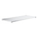 A white rectangular shelf with metal legs.