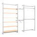 A white and silver metal retail display with shelves and hangrails.