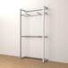 An Econoco retail wall display with shelves, hangrails, and faceouts on a white wall.