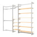 A white metal wall-mount retail display with shelves and faceouts.