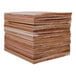 A stack of Wildwood Grilling cedar wood planks.