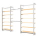 A white metal wall-mount retail display with shelves and faceouts.