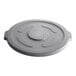 A gray plastic Advantage Supplies trash can lid for a 55 gallon round trash can.