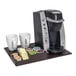 A room360 brown faux leather flat tray with a coffee maker and cups on it.
