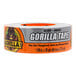 A roll of Gorilla silver duct tape with black and white text.