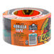 A roll of Gorilla Tough & Wide black duct tape with text on it.