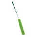 A green and white Libman Flexible Microfiber Wand Duster with a green pole.