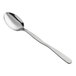 An American Metalcraft hammered stainless steel solid spoon with a long handle.