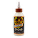 A white bottle of Gorilla Ultimate 8 oz. Wood Glue with a black label.