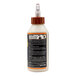 A white bottle of Gorilla Ultimate Wood Glue with a black label and brown cap.