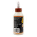 A white bottle of Gorilla Ultimate Wood Glue with a black label and brown cap.