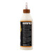A close up of a white bottle of Gorilla Ultimate Wood Glue with a brown cap.