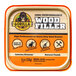 A tin of Gorilla Natural Wood Filler on a table.