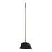A Libman commercial angle broom with a red handle.