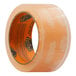A roll of Gorilla Crystal Clear tape with an orange label that reads "clear"