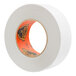 A white roll of Gorilla duct tape with an orange and black label.