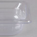 A clear plastic Vollrath food pan.