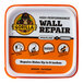 A container of Gorilla Wall Repair Spackling and Primer with a picture of a gorilla on the label.