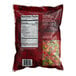 A white bag of Savor Imports IQF red and green diced peppers.