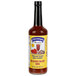 A bottle of Chincoteague Bloody Mary Clam and Tomato Juice Mix with a label on it.