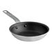 A close-up of a Vigor 7" aluminum frying pan with a black handle.