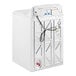 A white GE top load commercial washer with a black cord.