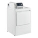 A white GE front load commercial dryer with the door open.