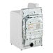 A white GE front load commercial dryer with a metal panel on the door.