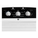 A white GE top load commercial washer with three dials and a control panel.