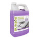 A purple plastic container of Sun Joe heavy-duty pressure washer cleaner with a white label.