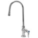 A silver Advance Tabco deck-mounted faucet with a blue lever handle.