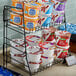 A rack of Kellogg's Wellness Cereal cups.