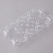 A clear polycarbonate tray with holes.