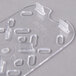 A clear plastic Vollrath drain tray with holes.